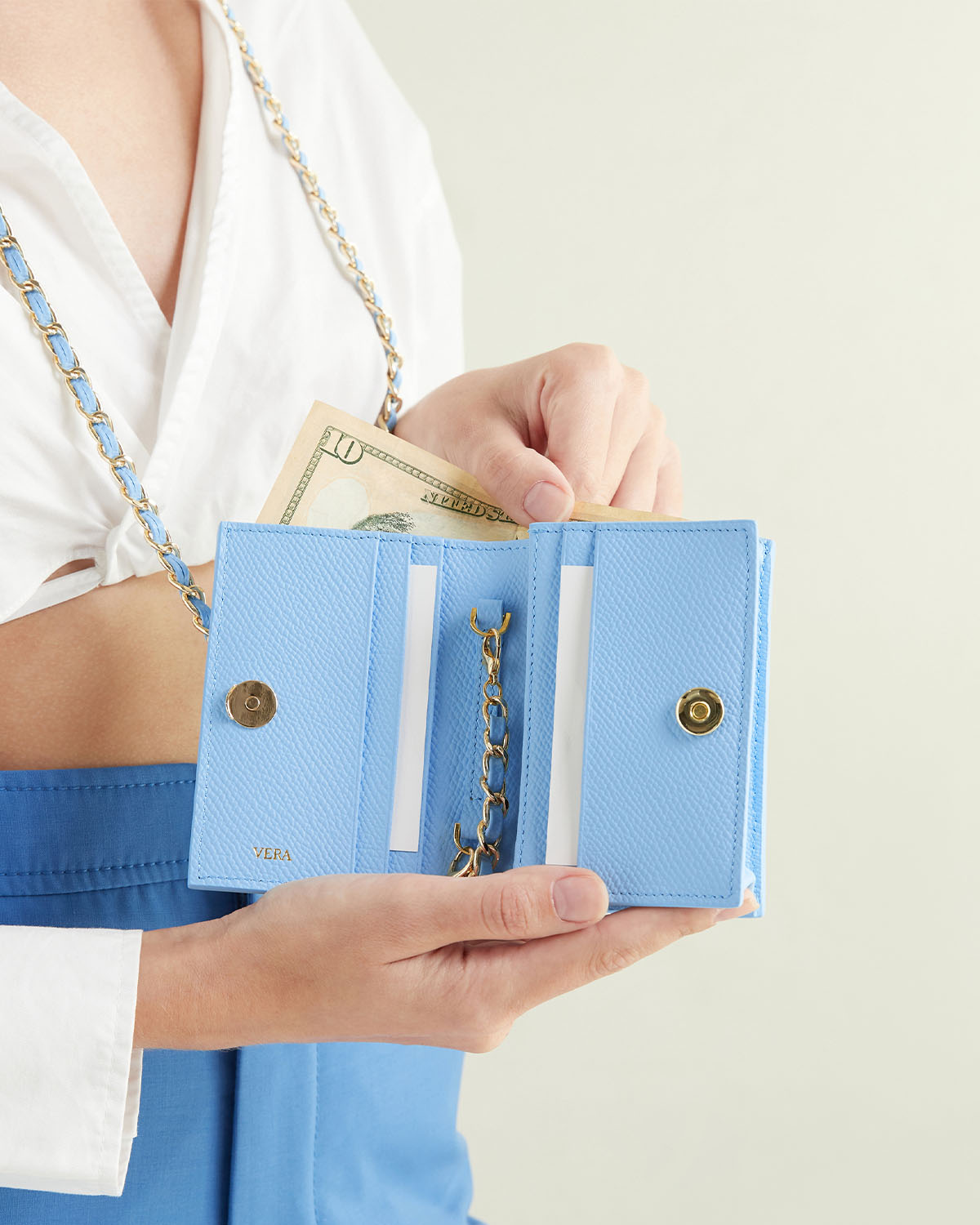 VERA Emily Flap Wallet with Leather Braided Gold Chain in Serene Blue กระเป๋าสตางค์หนังแท้ แบบเปิดฝา พร้อมสายโซ่สีทองร้อยหนัง สีฟ้า